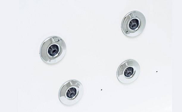 The image shows a set of four identical silver-colored door handles with black screws against a white background.